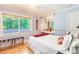 Serene bedroom with a peaceful atmosphere and access to outdoor views at 1130 Anclote Rd, Tarpon Springs, FL 34689