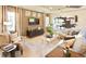 Elegant living room with sectional sofa and wood wall feature at 640 N Owl Dr, Sarasota, FL 34236