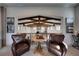 Open loft area with wood beams and comfortable seating at 640 N Owl Dr, Sarasota, FL 34236