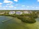 Aerial view of waterfront property with private dock access at 280 Hidden Bay Dr # 401, Osprey, FL 34229