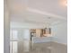 Open floor plan combining kitchen and living areas at 6009 White Mangrove Ln, Bradenton, FL 34210