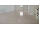 Bright and airy living room with large windows and tile flooring at 6009 White Mangrove Ln, Bradenton, FL 34210