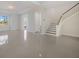 Spacious living room with stairs and shiny floors at 6009 White Mangrove Ln, Bradenton, FL 34210