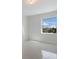 Spacious bedroom with large window and tile floors at 6009 White Mangrove Ln, Bradenton, FL 34210