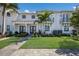 Modern townhome with landscaping and walkway at 6009 White Mangrove Ln, Bradenton, FL 34210