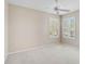 Bright bedroom with neutral walls, carpet flooring, and shuttered windows at 4063 Caddie E Dr, Bradenton, FL 34203