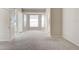Bedroom with neutral carpet and large windows at 4063 Caddie E Dr, Bradenton, FL 34203