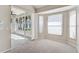 Living room with sliding glass doors and carpet at 4063 Caddie E Dr, Bradenton, FL 34203