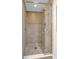Updated shower with glass doors and neutral tile at 376 Aruba Cir # 301, Bradenton, FL 34209