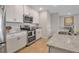 Modern kitchen with stainless steel appliances at 376 Aruba Cir # 301, Bradenton, FL 34209