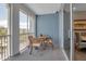 Spacious balcony with outdoor furniture and partial water view at 376 Aruba Cir # 301, Bradenton, FL 34209