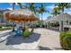 Relaxing outdoor space with seating, tables, and games at 376 Aruba Cir # 301, Bradenton, FL 34209