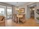 Light and airy dining area with an oval table and wicker chairs at 376 Aruba Cir # 301, Bradenton, FL 34209