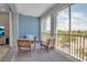 Relaxing balcony with seating and neighborhood view at 376 Aruba Cir # 301, Bradenton, FL 34209