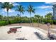 Community playground with play equipment and sandy area at 376 Aruba Cir # 301, Bradenton, FL 34209