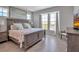 Main bedroom with large windows and a comfortable king-size bed at 376 Aruba Cir # 301, Bradenton, FL 34209
