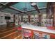 Community recreation room with a bar, pool table, and seating area at 376 Aruba Cir # 301, Bradenton, FL 34209