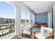 Relaxing balcony with seating and outdoor furniture at 376 Aruba Cir # 301, Bradenton, FL 34209