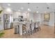 Modern kitchen with white shaker cabinets and an island at 376 Aruba Cir # 301, Bradenton, FL 34209