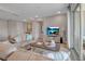 Comfortable living room with large sectional sofa and balcony access at 376 Aruba Cir # 301, Bradenton, FL 34209