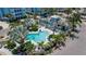 Resort-style pool with lush landscaping and a community clubhouse at 376 Aruba Cir # 301, Bradenton, FL 34209
