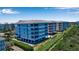 Aerial view of waterfront community with upscale buildings and lush landscaping at 376 Aruba Cir # 301, Bradenton, FL 34209