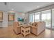 Bright living room with sliding glass doors leading to a balcony at 376 Aruba Cir # 301, Bradenton, FL 34209