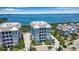 Luxury waterfront community featuring upscale three-story buildings with stunning water views at 376 Aruba Cir # 301, Bradenton, FL 34209