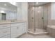 Modern bathroom featuring a large shower and white cabinets at 3426 79Th Street W Cir # 202, Bradenton, FL 34209