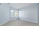 Light and airy bedroom with a window and neutral walls at 3426 79Th Street W Cir # 202, Bradenton, FL 34209