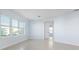 Spacious bedroom with large windows and light blue walls at 3426 79Th Street W Cir # 202, Bradenton, FL 34209