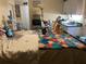 Small bedroom with a kitchenette and a bed at 512 1St E Ave, Bradenton, FL 34208
