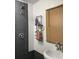 Bathroom with a shower and storage shelf at 512 1St E Ave, Bradenton, FL 34208