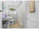 Clean bathroom with double vanity and shower at 512 1St E Ave, Bradenton, FL 34208
