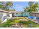 Backyard with small pool, patio, and shed at 512 1St E Ave, Bradenton, FL 34208