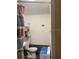 Small bathroom with toilet and combo washer/dryer at 512 1St E Ave, Bradenton, FL 34208
