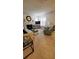 Bright living room with a fireplace and large windows at 3605 59Th W Ave # 4043, Bradenton, FL 34210