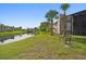 Community features a peaceful waterfront area with a bench at 3605 59Th W Ave # 4043, Bradenton, FL 34210