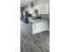 Modern kitchen with island and stainless steel appliances at 11261 3Rd Ave, Punta Gorda, FL 33955