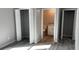 Bright bedroom with ensuite bathroom and spacious closet at 11261 3Rd Ave, Punta Gorda, FL 33955
