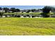 Peaceful backyard view of a pond and neighboring homes at 11420 Captiva Kay Dr, Riverview, FL 33569