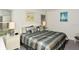 King-size bedroom with ample closet space at 1046 W Peppertree Ln # 115B, Sarasota, FL 34242
