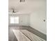 Bright living room with vinyl plank flooring and lots of natural light at 3875 Pan American Blvd, North Port, FL 34287