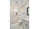 Modern bathroom with walk-in shower and gray vanity at 3875 Pan American Blvd, North Port, FL 34287