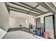 Spacious garage with high ceilings and open door at 3875 Pan American Blvd, North Port, FL 34287