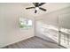Bedroom with large closet and window overlooking the street at 3875 Pan American Blvd, North Port, FL 34287
