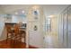 Clean entryway with built-in shelving and kitchen access at 1801 Gulf N Dr # 248, Bradenton Beach, FL 34217