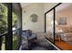 Screened balcony with seating and view at 1801 Gulf N Dr # 248, Bradenton Beach, FL 34217