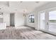 Spacious dining area with hardwood floors and modern chandelier at 200 Redwood Rd, Rotonda West, FL 33947