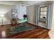 Bright home office features hardwood floors and window seat at 6201 Green View Dr # 130, Sarasota, FL 34231